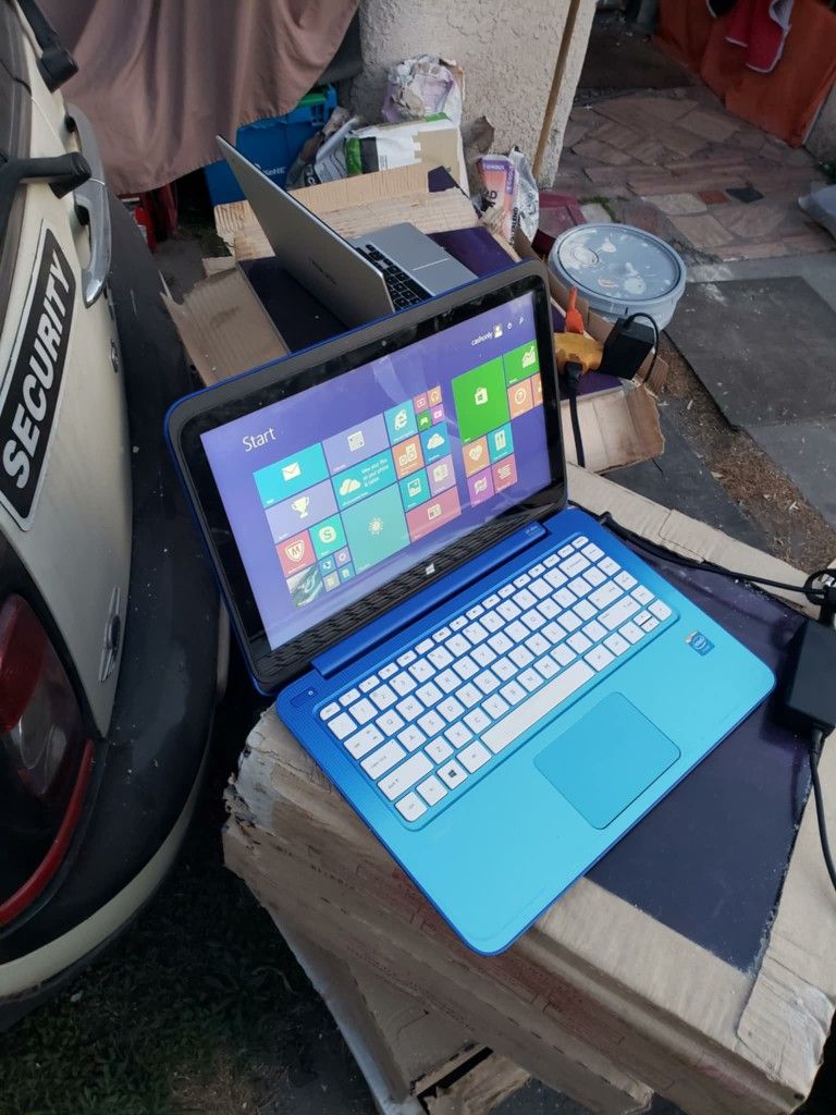 Free Delivery & with charger It come... $200! HP blue Touchscreen 4GB ram 500GB all work 100% is factory reset... trade are welcome. All work 100%