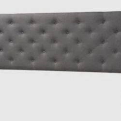 Gray tufted bed frame and headboard