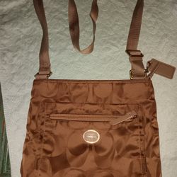 Coach Nylo Crossbody In Brown 