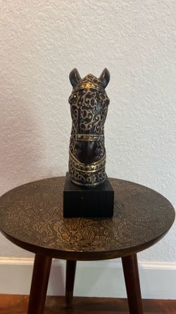 Horse head statue  with small side  table