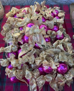 Pink Christmas Ornaments with Gold Bows.