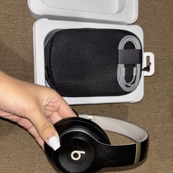 Black and beige Beats by dre studio pros 