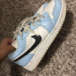 size 6 women’s Jordans in baby blue