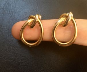 Gold colored hoop knot post earrings