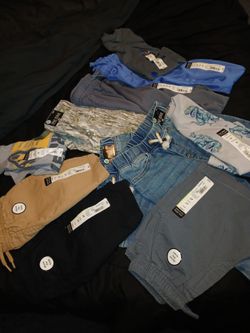 *BRAND NEW NEVER WORN**Assortment of boys and girls 4T Pants, Shorts and Tops