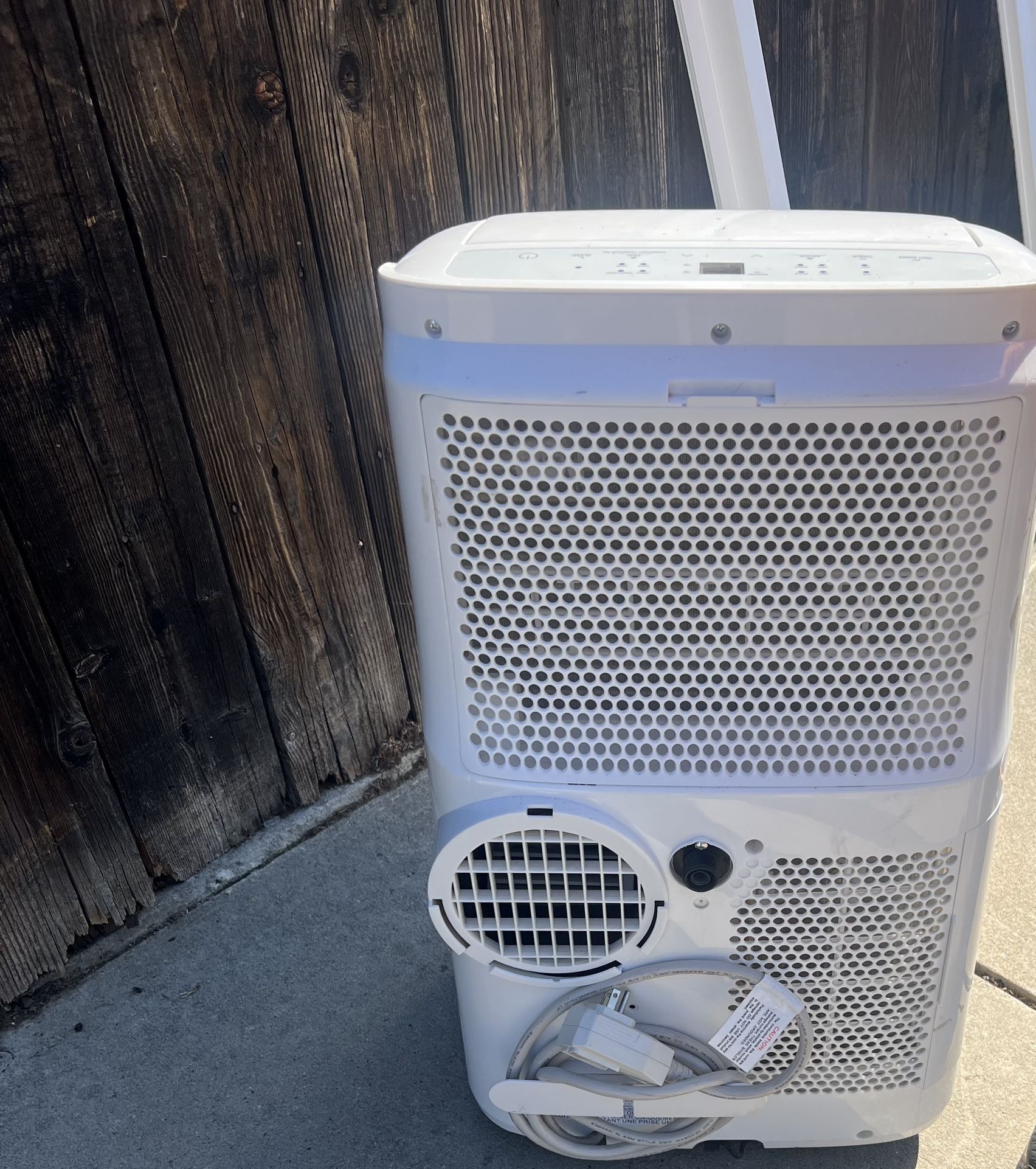 Air Conditioner Cools with Dehumidifier