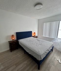 Bed frame, bed side tables, mattress & lamps