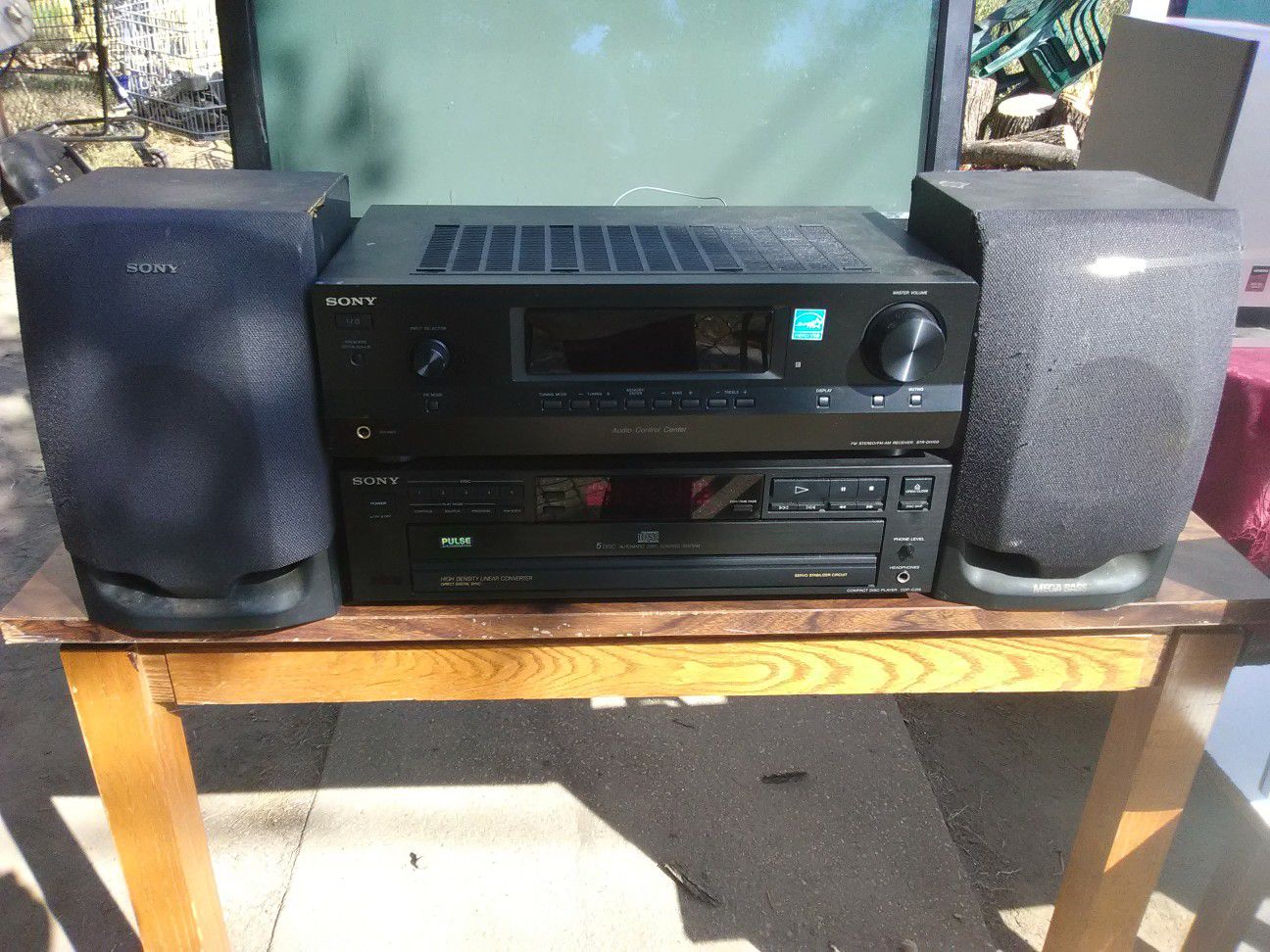 300 Watts Sony receiver with remote control and 5 disc CD player plus bookshelf speakers