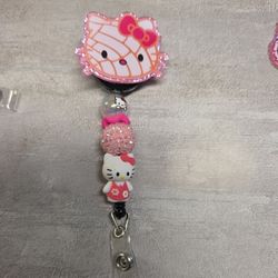 Concha hello Kitty Badge Reel