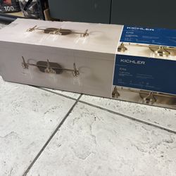 KICHLER - ERTA 24 inch 3-Light Champagne Bronze Bathroom Vanity Light - Clear Glass Shades