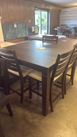 36 inch high table and 424 inch stools for 999 brand new