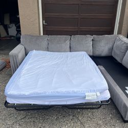 Ashley 2 Piece Sectional W Pull-out Mattress (DELIVERY AVAILABLE)