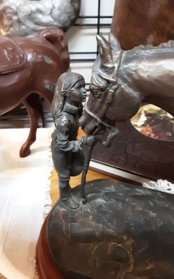 "First Love" Montana Lifestyle Silversmith Statue- Located in Shelton