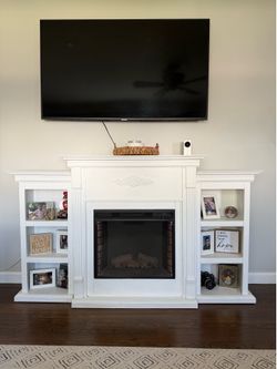 Electric fireplace with book shelves
