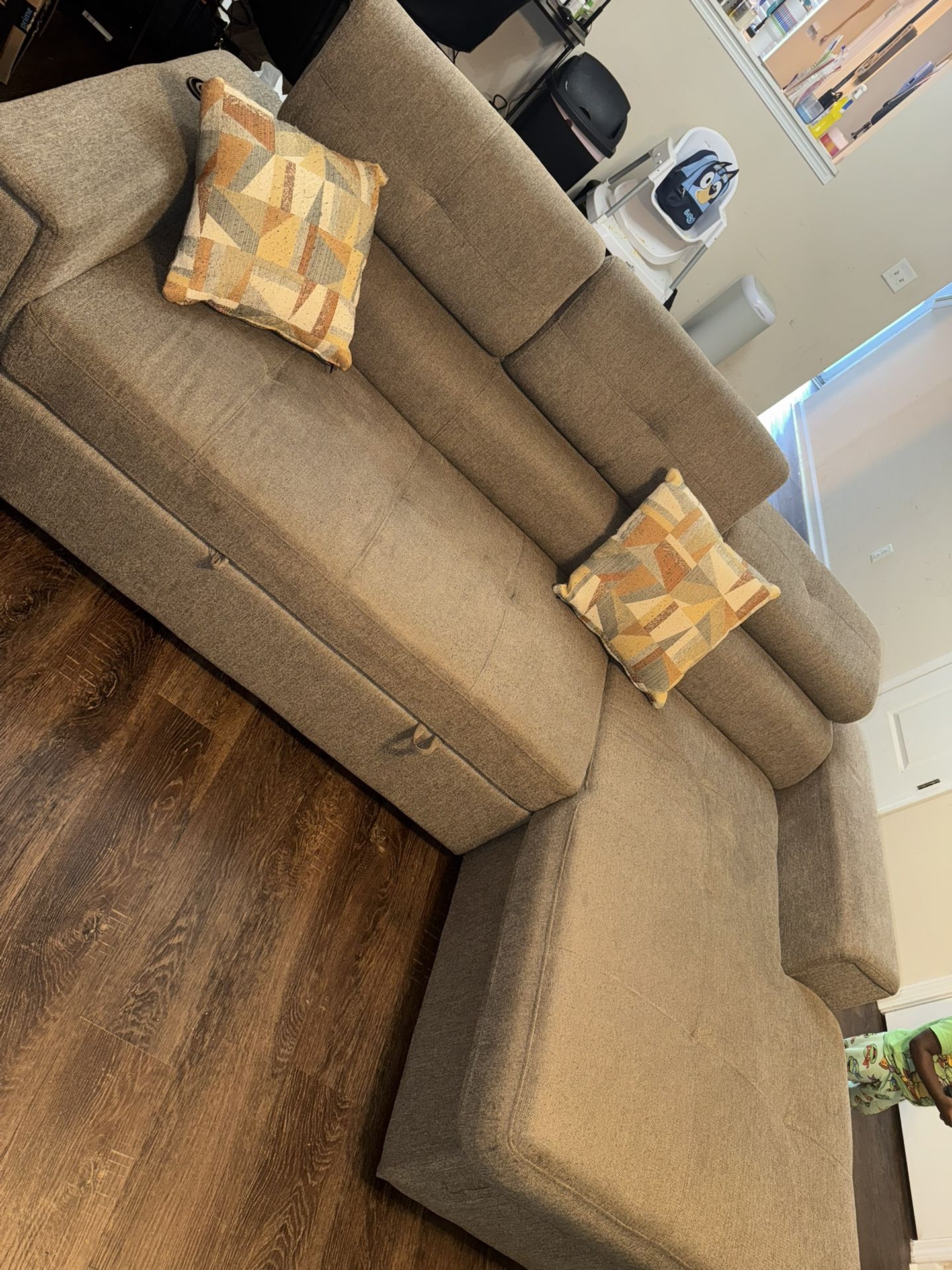 Gray Sectional And Swivel Chair