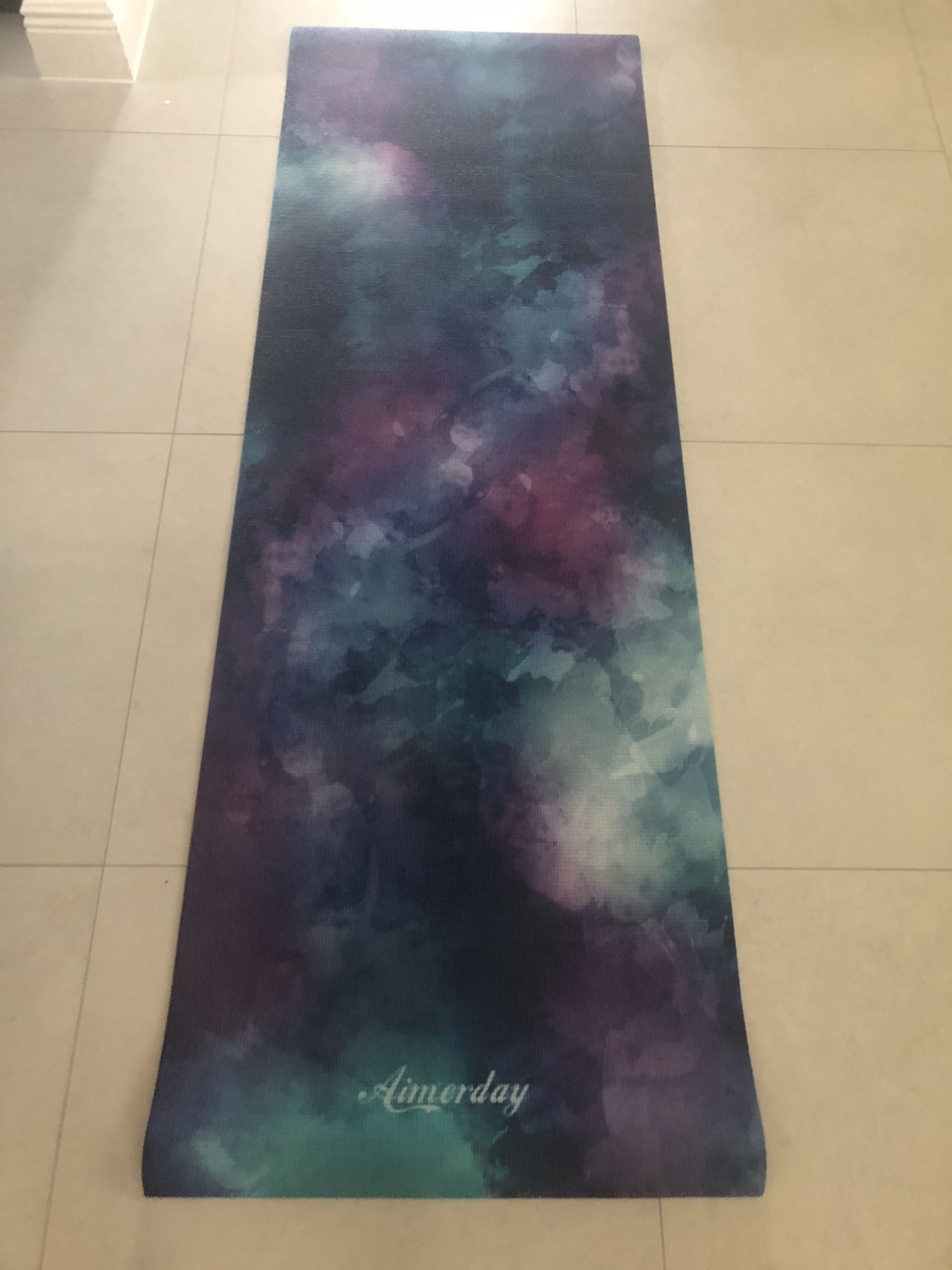 Brand new, never used yoga mat! Cool design!