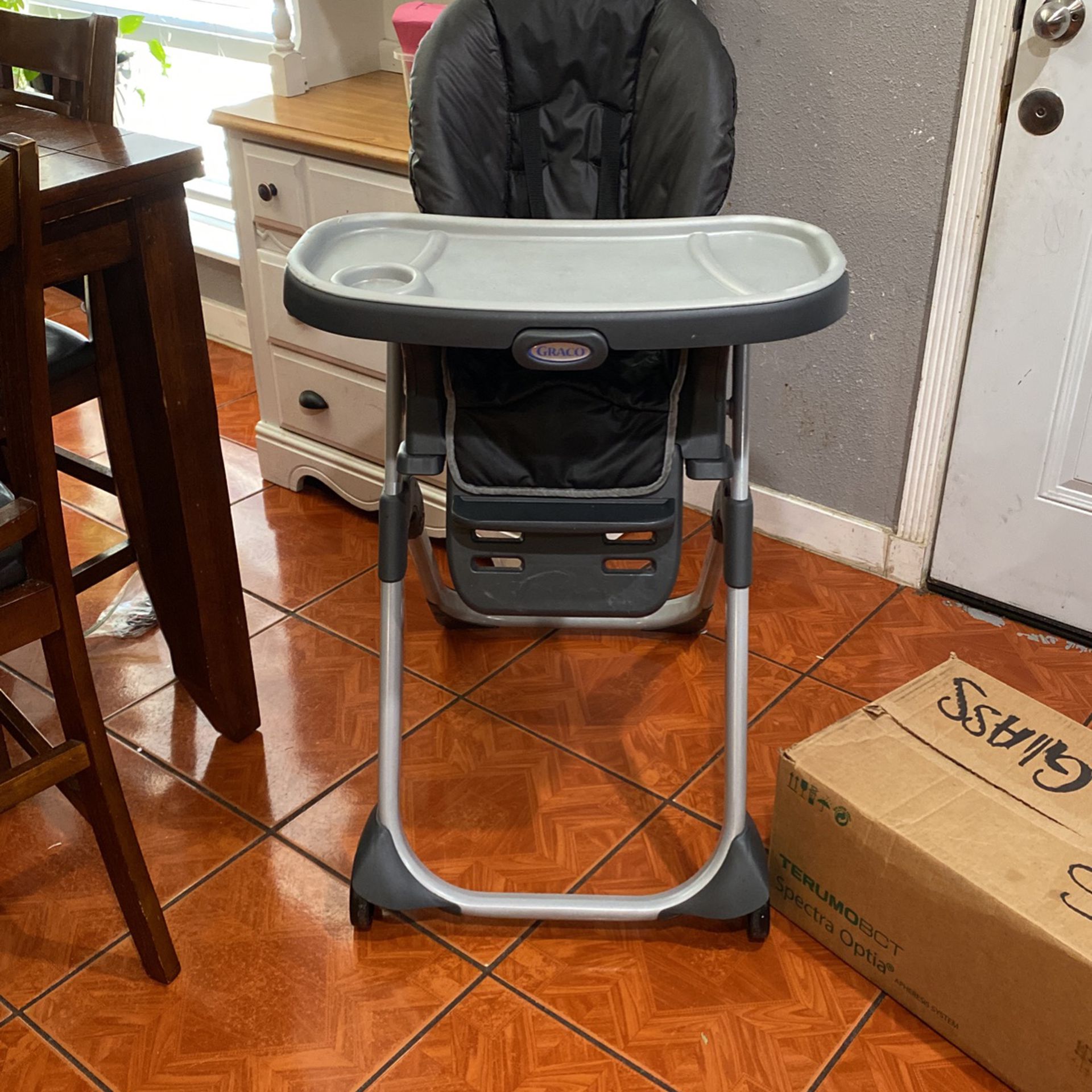 Graco High Chair. It reclines and can take the seat off to strap on dining table chair.  