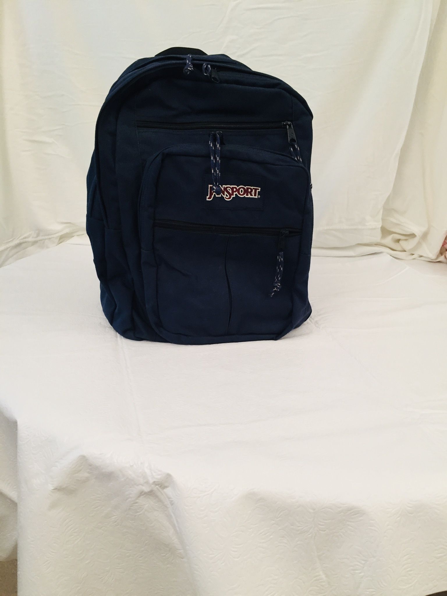 Famous Jansport backpack. Unisex. Very capacious. Barely used. Like new condition. Dark blue. Good for students, good for everyone. Great Bargain.