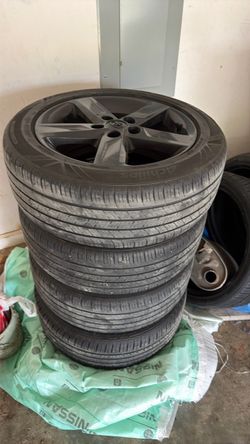 4 tires and rims Toyota Camry