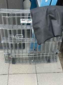 Dog gate with tarp