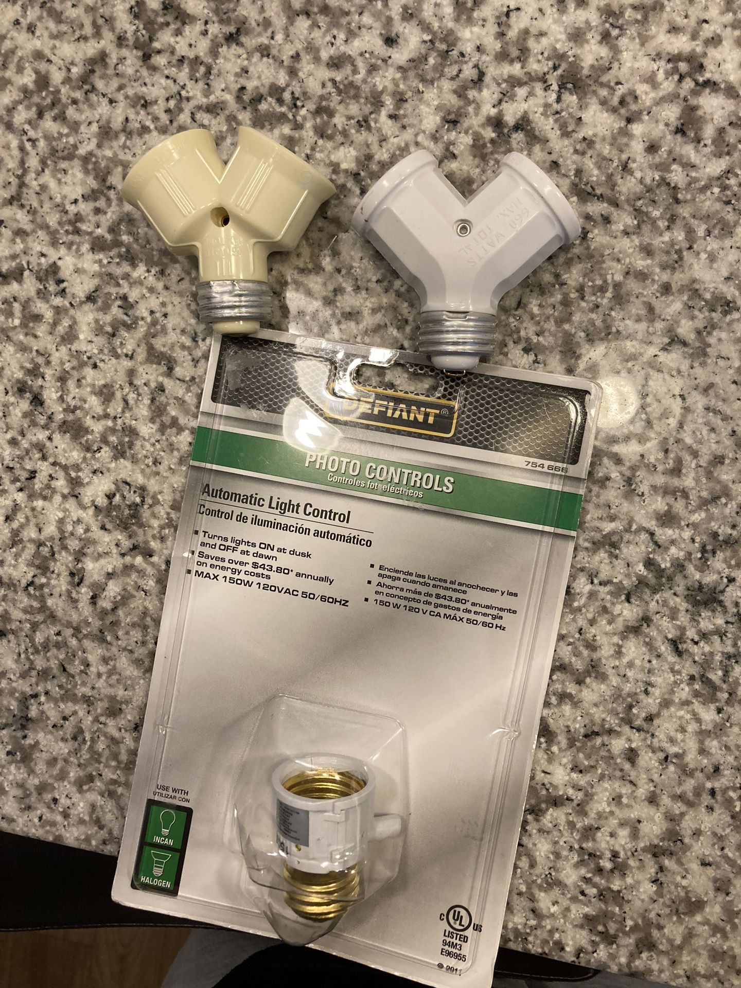 Defiant autmatic light control and two light bulb adaptor
