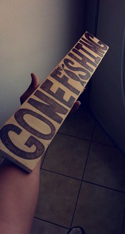 Self-made gone fishing wood burn
