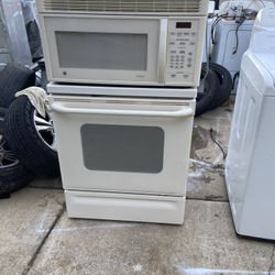Cream GE Stove And Microwave Oven