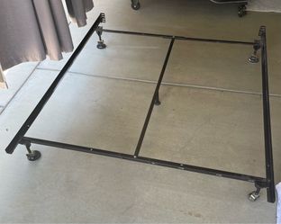 Metal bed frame for a queen size bed