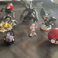 collection of assorted Pokémon figures and toys