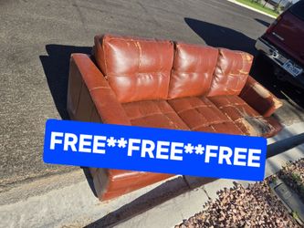 Old brown reddish leather couch for free