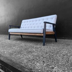 Lovely MCM Tufted Couch With A Wooden Frame