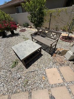 Bench and stone top table