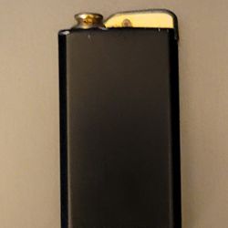 VINTAGR JAPANESE PERFUME ATOMIZER BLACK AND GOLD LOOKS LIKE LIGHTER