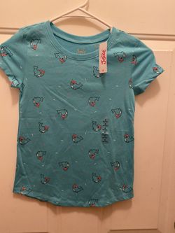 Justice shirt new size 8 aqua with wharol