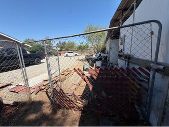 Two panel fences one with door