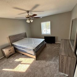 BRAND NEW 4-PIECE BEDROOM SET. SLEEK WOODEN FINISH(BED, DRESSER, MIRROR, NIGHTSTAND). KING or QUEEN