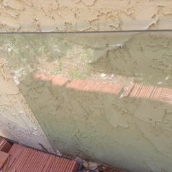 Table glass  52 “ X 25” , 72” X  37”  $100.00 CASH 