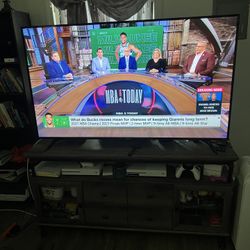 65 In Tv With Tv Stand 