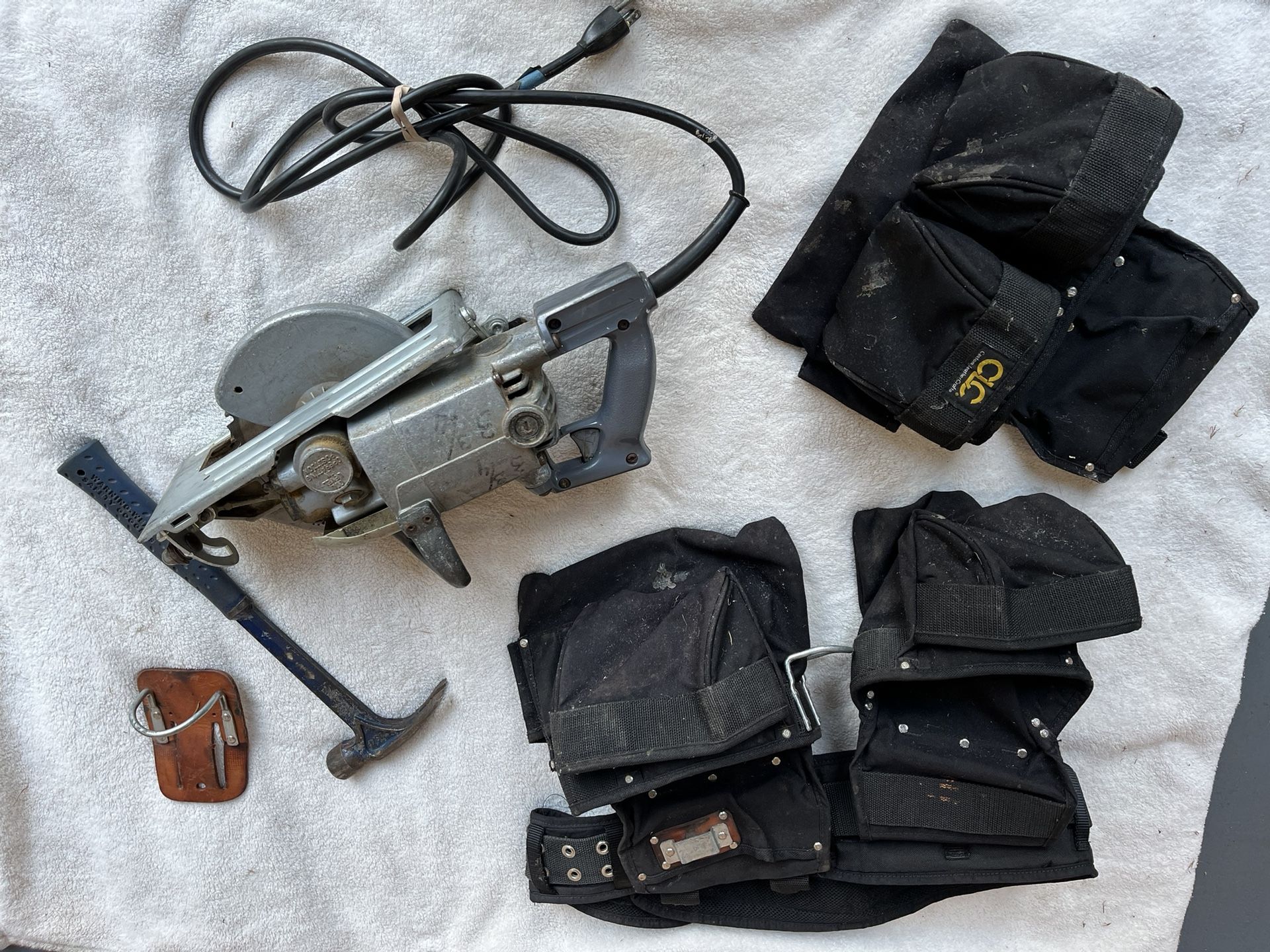 Saw with tool belts