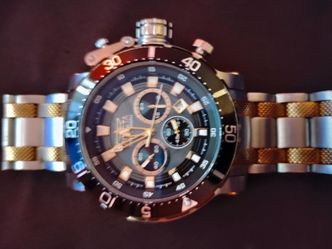 Men's Invicta watch.