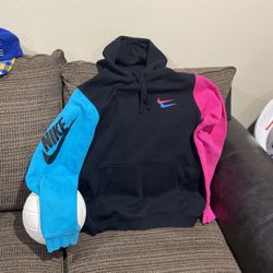 Size Large, Double Nike Sign. Vintage multicolor sweater made in Egypt.