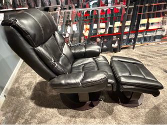 Swivel recliner chair with matching ottoma