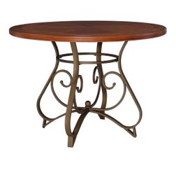 Round cherry wood dining table