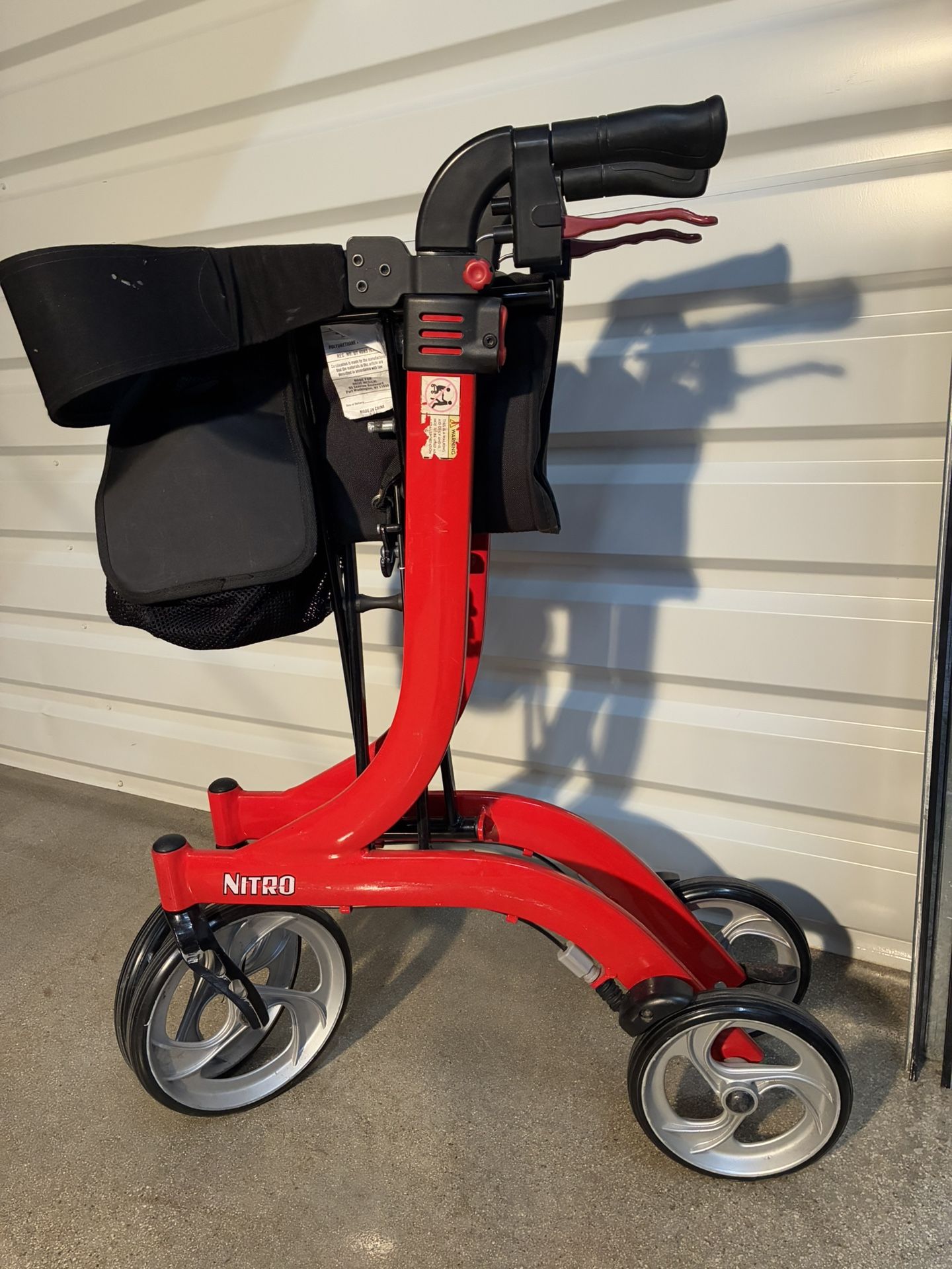 Drive Nitro Four Wheeled Walker w/ Padded Seat & Pouch.•