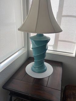 End Tables with Teal Lamps