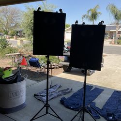 Wharfedale Pro stage speakers with stands and rollers