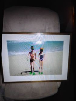 Barbie on the beach photograph in glass wood frame