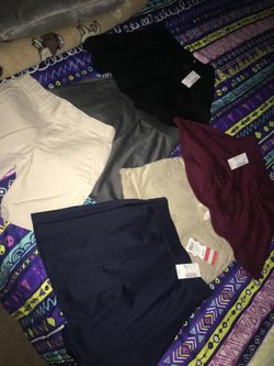 Brand new school uniforms with tags 4 skirts and 2 capris