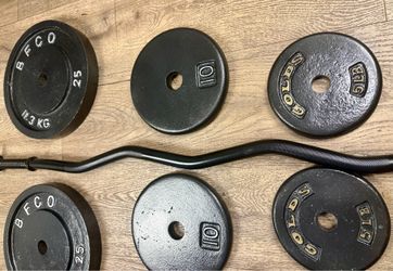 BRAND NEW: Standard Black Curl Bar with Cast Iron Weight Plates of 25s, 10s and 5 lbs. Total= 94 lbs