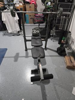 Weight bench with bar and weights